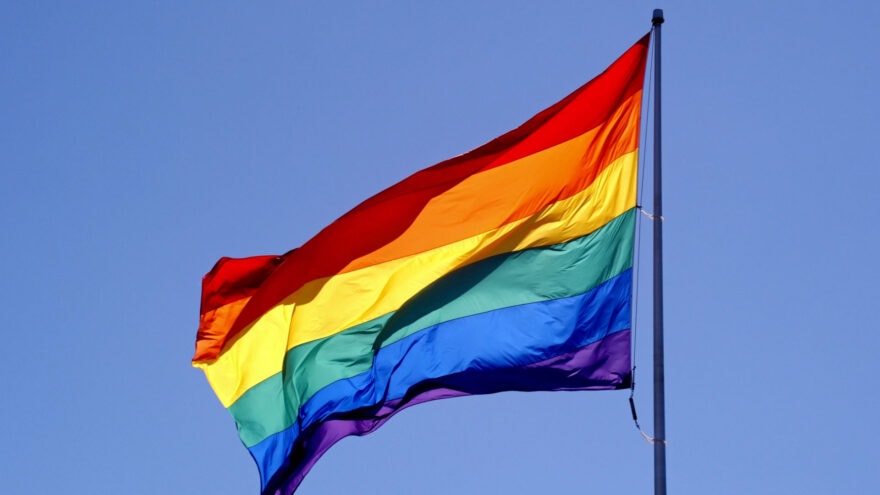 Rainbow flag on flag pole